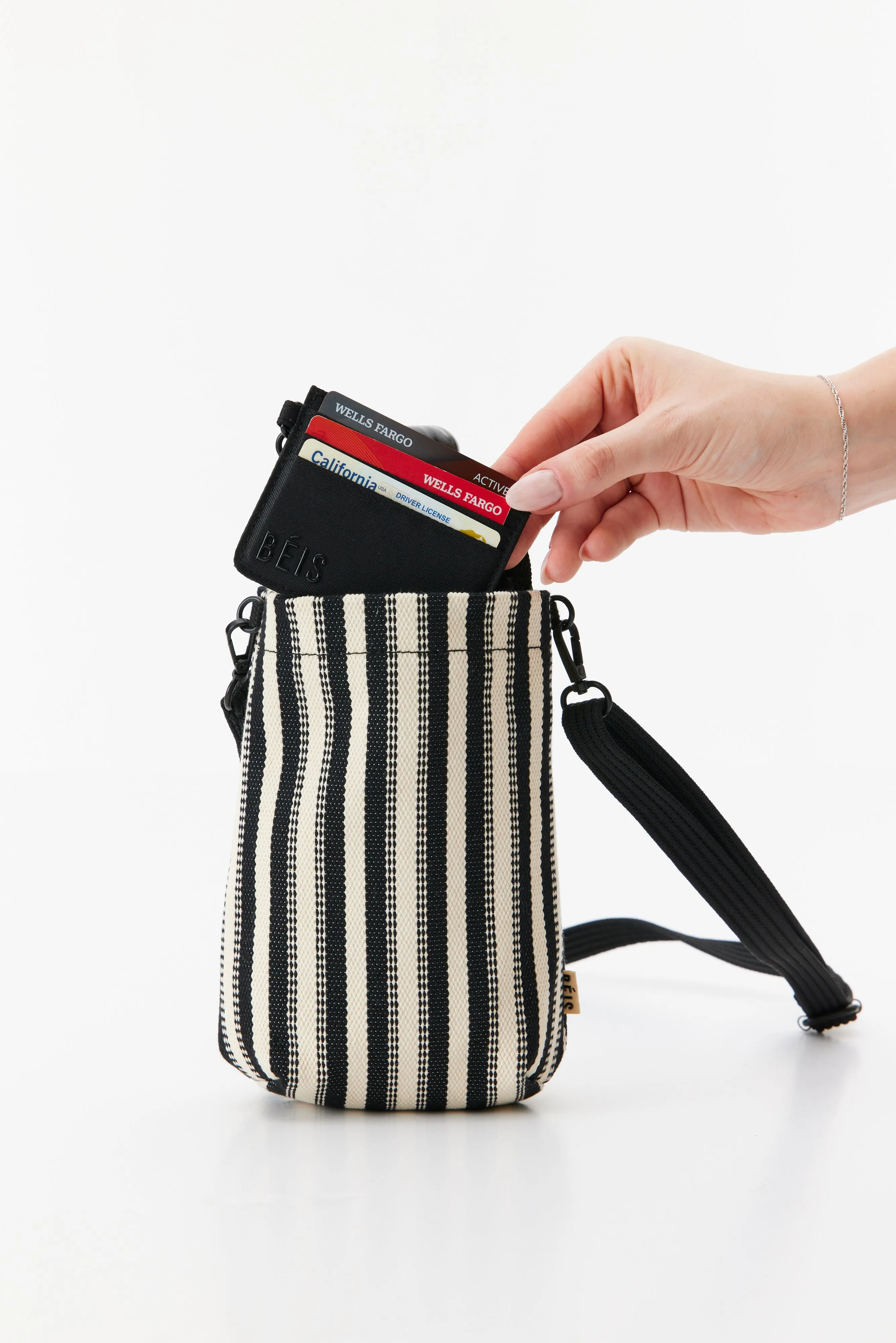 The Water Bottle Crossbody in Black Stripe