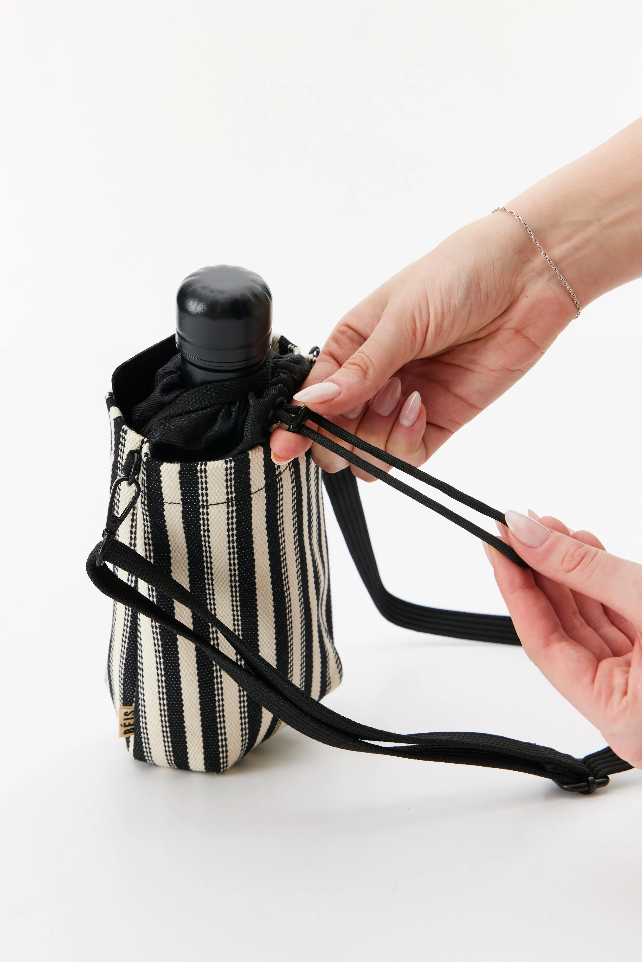 The Water Bottle Crossbody in Black Stripe